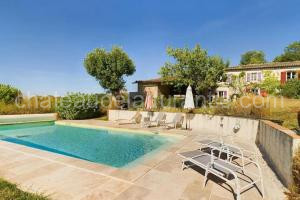 Photo de la Maisons de vacances Maison Littré - Piscine chauffée - Au calme entre vignes et forêt à Castelnau-de-Montmiral